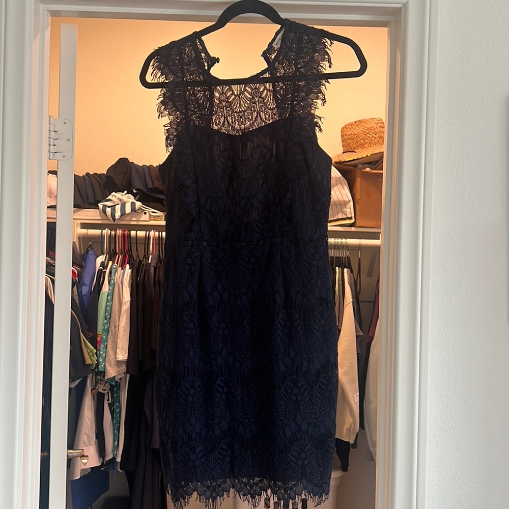 Blue lace size medium dress. Never worn. New without tags